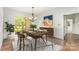 Elegant dining room featuring modern decor and a view of the landscaped yard at 426 Saint Michaels Way, Fort Mill, SC 29708