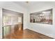 Bright dining room offering hardwood floors and a pass-through view to the adjacent kitchen area at 426 Saint Michaels Way, Fort Mill, SC 29708