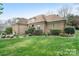 Well-manicured lawn and landscape leading up to a brick exterior at 426 Saint Michaels Way, Fort Mill, SC 29708