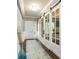 Inviting hallway with wood floors, sliding glass doors, and neutral decor with a decorative vase at 487 Hawks Creek Pkwy, Fort Mill, SC 29708