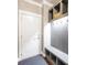 Functional mudroom featuring built-in storage, hooks, and a durable rug near the entrance door at 487 Hawks Creek Pkwy, Fort Mill, SC 29708