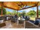Outdoor patio area complete with outdoor furniture, grill, and ceiling fan at 487 Hawks Creek Pkwy, Fort Mill, SC 29708