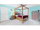 Bedroom featuring a four-post bed, wood furnishings, and light blue walls at 4896 Pageland Hwy, Lancaster, SC 29720