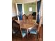 Dining area with a vintage table set, hardwood floors and access to living space through french doors at 4896 Pageland Hwy, Lancaster, SC 29720