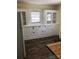 Classic kitchen design with custom cabinets, modern flooring, and ample storage at 4896 Pageland Hwy, Lancaster, SC 29720