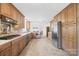 Large kitchen with granite countertops, stainless appliances, and tile flooring at 4896 Pageland Hwy, Lancaster, SC 29720