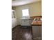 Traditional kitchen featuring butcher block countertops, updated appliances and wood-look flooring at 4896 Pageland Hwy, Lancaster, SC 29720