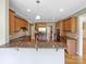 Well-equipped kitchen with granite countertops, wood cabinets, and stainless steel appliances, ideal for cooking enthusiasts at 5104 Shannamara Dr, Matthews, NC 28104
