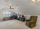 Spacious Bonus Room featuring vaulted ceilings, neutral paint, and large chair and desk at 557 Luther Dr, Iron Station, NC 28080