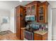 Stylish kitchen featuring custom cabinets, granite countertops, and stainless steel appliances at 557 Luther Dr, Iron Station, NC 28080