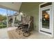 Outdoor screened-in porch area perfect for entertaining and relaxation at 557 Luther Dr, Iron Station, NC 28080