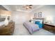 Relaxing main bedroom featuring tray ceilings and ample lighting at 7035 Butternut Oak Ter, Huntersville, NC 28078