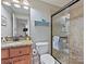 Nicely designed bathroom with granite countertops and a tiled shower with glass door at 7208 Ashton Gate Dr, Charlotte, NC 28270