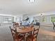 Spacious bonus room with home gym equipment, a chess table and view of the bedroom at 7208 Ashton Gate Dr, Charlotte, NC 28270