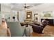 Inviting living room with hardwood floors, fireplace, coffered ceilings, and stylish furniture at 7208 Ashton Gate Dr, Charlotte, NC 28270