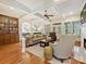 Spacious living room with coffered ceilings, hardwood floors, fireplace, and ample seating at 7208 Ashton Gate Dr, Charlotte, NC 28270