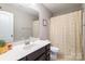 Bathroom featuring a vanity with a dark wood cabinet, a mirror, and a shower curtain at 78090 Rillstone Dr, Lancaster, SC 29720