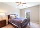 Comfortable bedroom with natural light, a ceiling fan, and a well-maintained carpet at 78090 Rillstone Dr, Lancaster, SC 29720