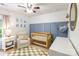 Cozy Bedroom design with crib, chair, and stylish decor accents at 78090 Rillstone Dr, Lancaster, SC 29720