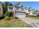 Beautifully landscaped two-story home with a well-manicured lawn and a two-car garage in a desirable location at 78090 Rillstone Dr, Lancaster, SC 29720