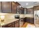 Modern kitchen with granite countertops, stainless steel appliances, and ample cabinet space at 78090 Rillstone Dr, Lancaster, SC 29720