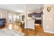 Open-concept space with a breakfast bar that connects the kitchen, dining area, and living room at 78090 Rillstone Dr, Lancaster, SC 29720
