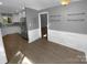 Inviting dining area with stylish shelving and white trim, adjacent to the kitchen at 8000 Briardale Dr, Charlotte, NC 28212