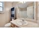 Bathroom featuring a single sink, a large mirror, a toilet, a shower, and built in shelving at 835 Holdcroft Ln, Rock Hill, SC 29730