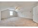 Large bonus room offers natural light from windows and a ceiling fan at 835 Holdcroft Ln, Rock Hill, SC 29730