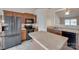 Kitchen with an island, wood cabinets and stainless steel appliances at 835 Holdcroft Ln, Rock Hill, SC 29730