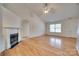 Bright living room featuring beautiful hardwood floors, fireplace and a vaulted ceiling at 835 Holdcroft Ln, Rock Hill, SC 29730