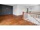 Second floor hallway with hardwood floors and stairway at 913 Van Every St, Charlotte, NC 28205