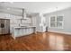 Open-concept with gleaming hardwoods, modern kitchen and breakfast nook at 913 Van Every St, Charlotte, NC 28205