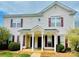 Charming townhouse with inviting entrance and manicured landscaping at 9615 Littleleaf Dr, Charlotte, NC 28215
