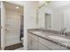 Bathroom features granite double vanity and shower at 9727 White Chapel Nw Dr, Concord, NC 28027