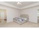 Cozy bedroom featuring a comfortable queen bed and neutral-toned decor at 9727 White Chapel Nw Dr, Concord, NC 28027