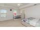 Charming bedroom featuring a bunk bed, plush carpet, and abundant natural light at 9727 White Chapel Nw Dr, Concord, NC 28027