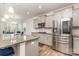 Stylish kitchen with granite countertops and stainless steel appliances at 9727 White Chapel Nw Dr, Concord, NC 28027