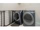 Convenient laundry room featuring washer and dryer at 9727 White Chapel Nw Dr, Concord, NC 28027