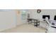 Functional office space with natural light, featuring desks and storage at 9727 White Chapel Nw Dr, Concord, NC 28027