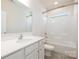 Bathroom featuring a shower and bathtub combination, natural light, and single vanity at 1005 Argentium Way, Waxhaw, NC 28173