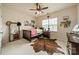 Bedroom decorated with a western theme and a ceiling fan at 1005 Argentium Way, Waxhaw, NC 28173