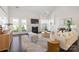 Cozy living room features a fireplace, French doors, and neutral decor at 1005 Argentium Way, Waxhaw, NC 28173