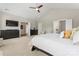 Large primary bedroom offers vaulted ceilings, plush carpet, and ensuite bathroom at 10072 Fox Trotter Ln, Midland, NC 28107