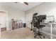 Bright office space featuring modern white desk, ergonomic chair, and ample storage for a functional work environment at 10072 Fox Trotter Ln, Midland, NC 28107