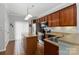Modern kitchen with stainless steel appliances, breakfast bar, and ample cabinet space, ideal for cooking at 1013 Laparc Ln, Indian Trail, NC 28079