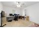 Bright office space with neutral walls, carpet, and a window for natural lighting, perfect for a productive workspace at 1013 Laparc Ln, Indian Trail, NC 28079