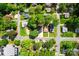 Aerial view of a neighborhood with houses, trees, and streets at 10202 Orchard Grass Ct, Charlotte, NC 28278