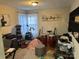 Bonus room featuring an array of musical instruments, play area, and natural light at 10202 Orchard Grass Ct, Charlotte, NC 28278