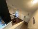 Open concept living space featuring hardwood floors and two-story ceilings at 10202 Orchard Grass Ct, Charlotte, NC 28278